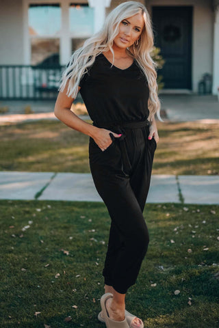 Black Casual Jumpsuit - tapered leg jumpsuit with belted waist and long sleeve, and side pockets #Firefly Lane Boutique1