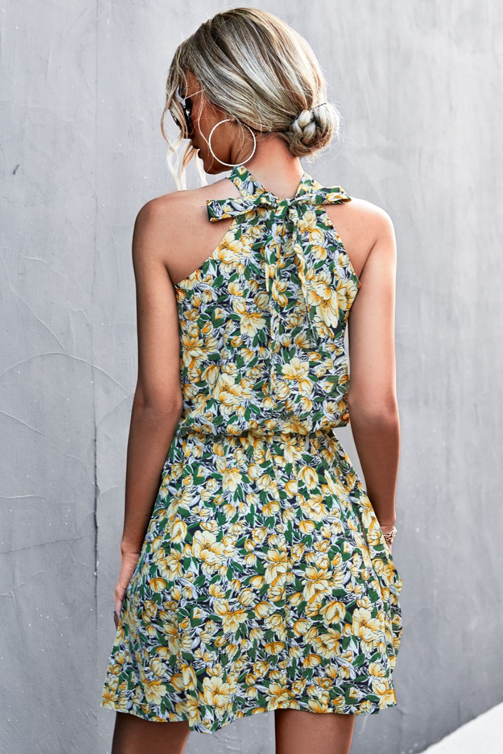 Change The Tune Floral Mini Sleeveless Dress - yellow floral mini dress with a halter neck and tiered #Firefly Lane Boutique1