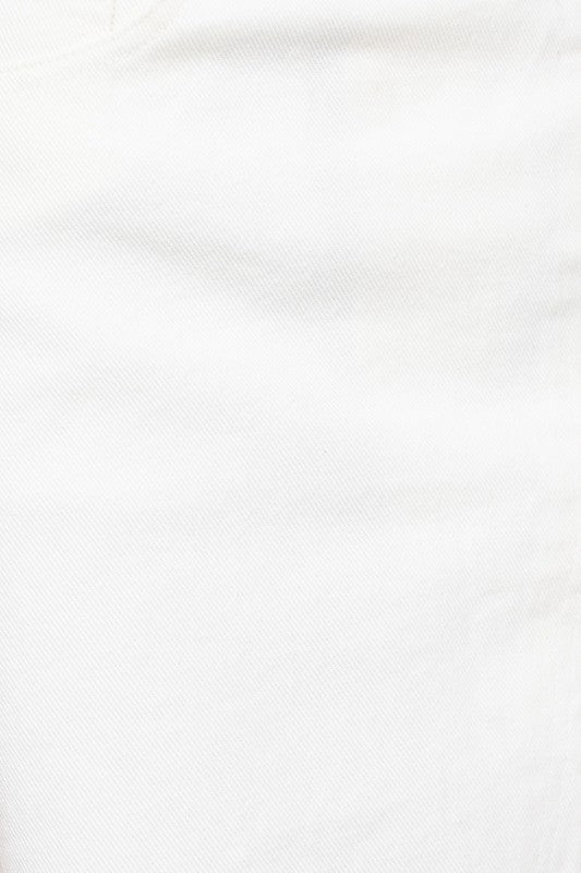 Crossover Chic Mini White Denim Skirt white denim skirt with overlap style and frayed hem. Firefly Lane Boutique1