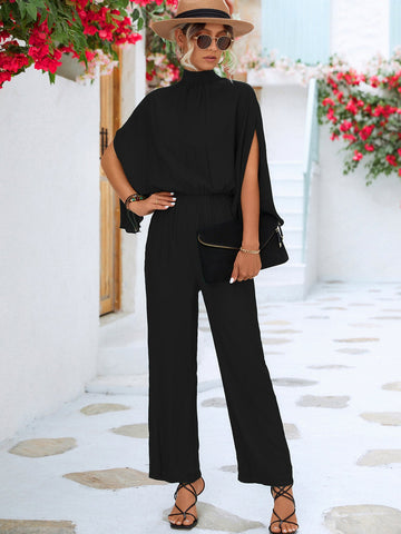 Draped In Style Caped Jumpsuit - black caped jumpsuit with a mock neck and split quarter sleeves. #Firefly Lane Boutique1