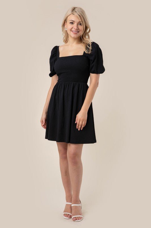 Mini A Line Summer Black Dress with a square neck, puff sleeves, and smocked waist! #Firefly Lane Boutique1