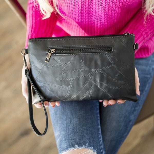 Out The Door Crossbody Studded Clutch Bag a black studded bag. Wear as clutch or crossbody bag. #Firefly Lane Boutique1