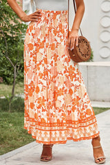 Such A Delight Tiered Floral Smocked Maxi Skirt orange floral maxi skirt at ankle length. #Firefly Lane Boutique1