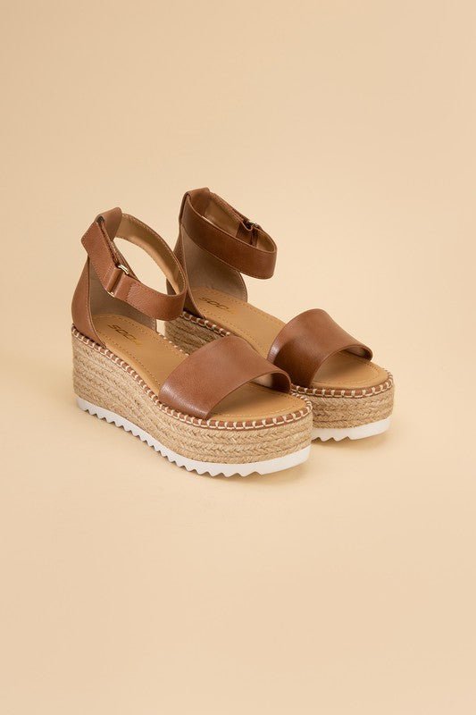 Sun Kissed Steps Cute Platform Sandals brown platform sandals with open toe and have an ankle strap. #Firefly Lane Boutique1