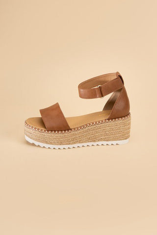 Sun Kissed Steps Cute Platform Sandals brown platform sandals with open toe and have an ankle strap. #Firefly Lane Boutique1